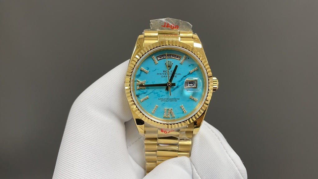 Day-Date 36 - geelgoud met turquoise wijzerplaat