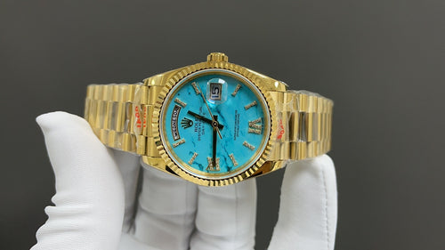 Day-Date 36 - geelgoud met turquoise wijzerplaat