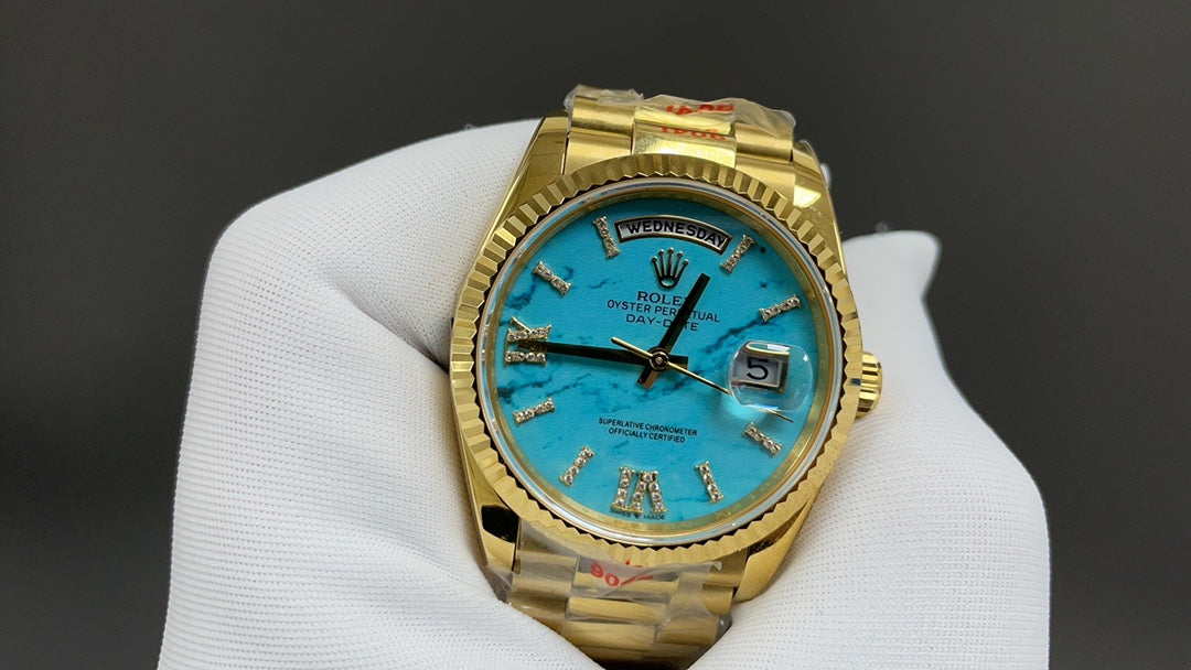 Day-Date 36 - geelgoud met turquoise wijzerplaat