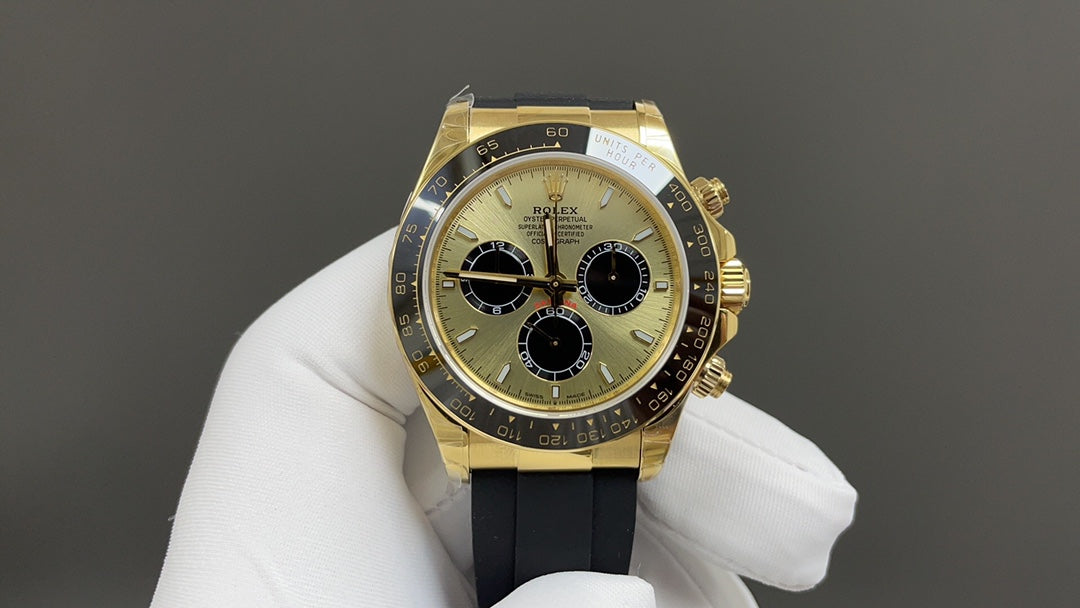 Cosmograph Daytona - geelgoud met champagnekleurige wijzerplaat